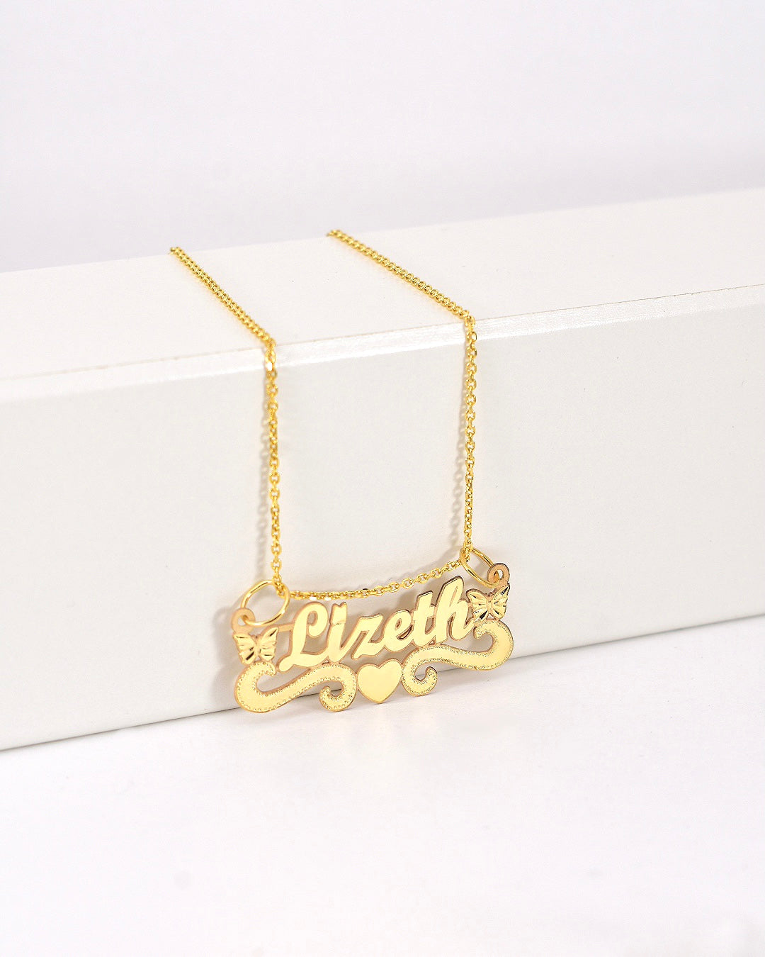 Diamond Cut Swirl Double Butterfly and Heart Cursive Gold Name Necklace